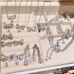 Conjunto de joyas de lujo para mujer, pendientes geométricos, diseño de lazo y collar.