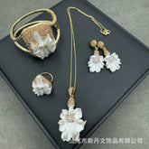 New shell powder embossed jewelry set inlaid with baroque pearls exquisite four-piece set medieval jewelry wholesale