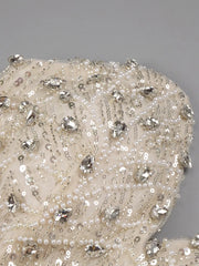 VC Nude Strapless Crystals Embellished Long Dress Sheath Low V Neck Sleeveless Feather High Side Slit Floor Length Evening Gown