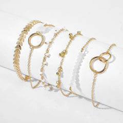 Moderno juego de 6 pulseras apilables con diseño geométrico y borlas ajustables: perfecto para el día a día y ocasiones especiales.