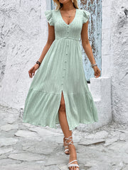Vestido de verano con escote en V y textura de color sólido fresco y nuevo, muy vendido en Europa y Estados Unidos. 